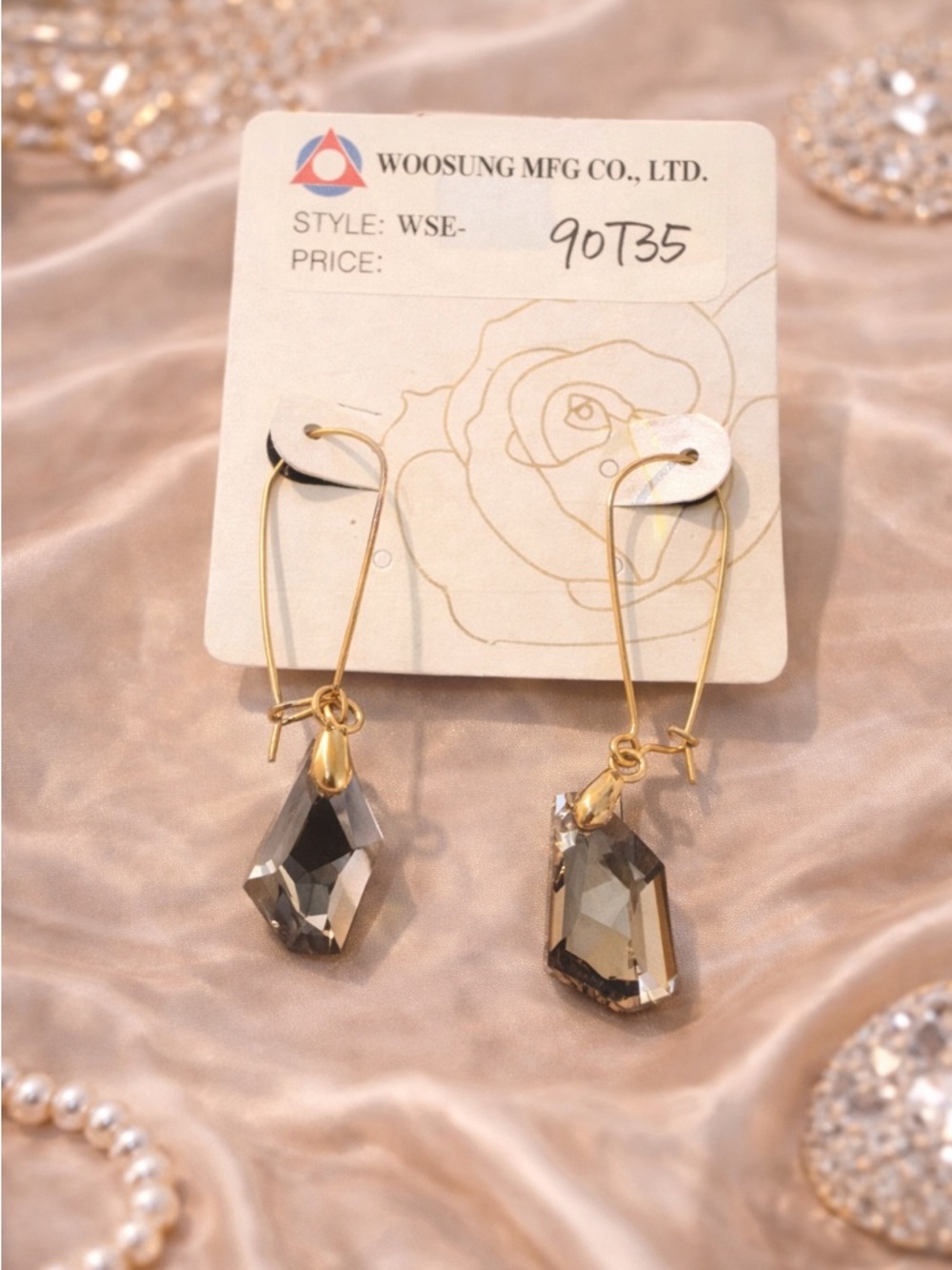 WOOSUNG MFG CO. Gold Drop Earrings with Smoky Crystal Pendants